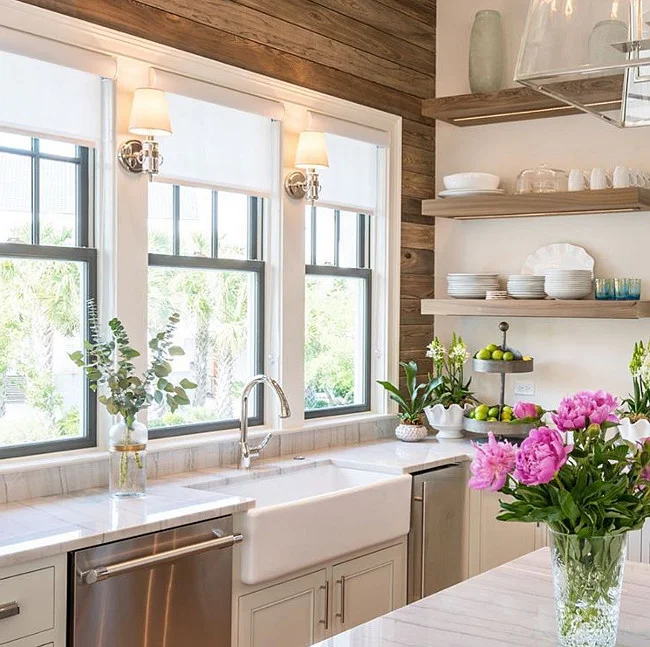 One of my must haves in a kitchen besides plenty of storage is large windows to bring in the light, I love to cook and natural light makes me happy. The farmhouse sink is Rohl 36". 