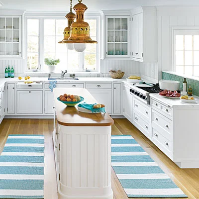 If you have a beach house, this darling coastal kitchen might be the perfect inspiration for a much needed kitchen renovation. via
