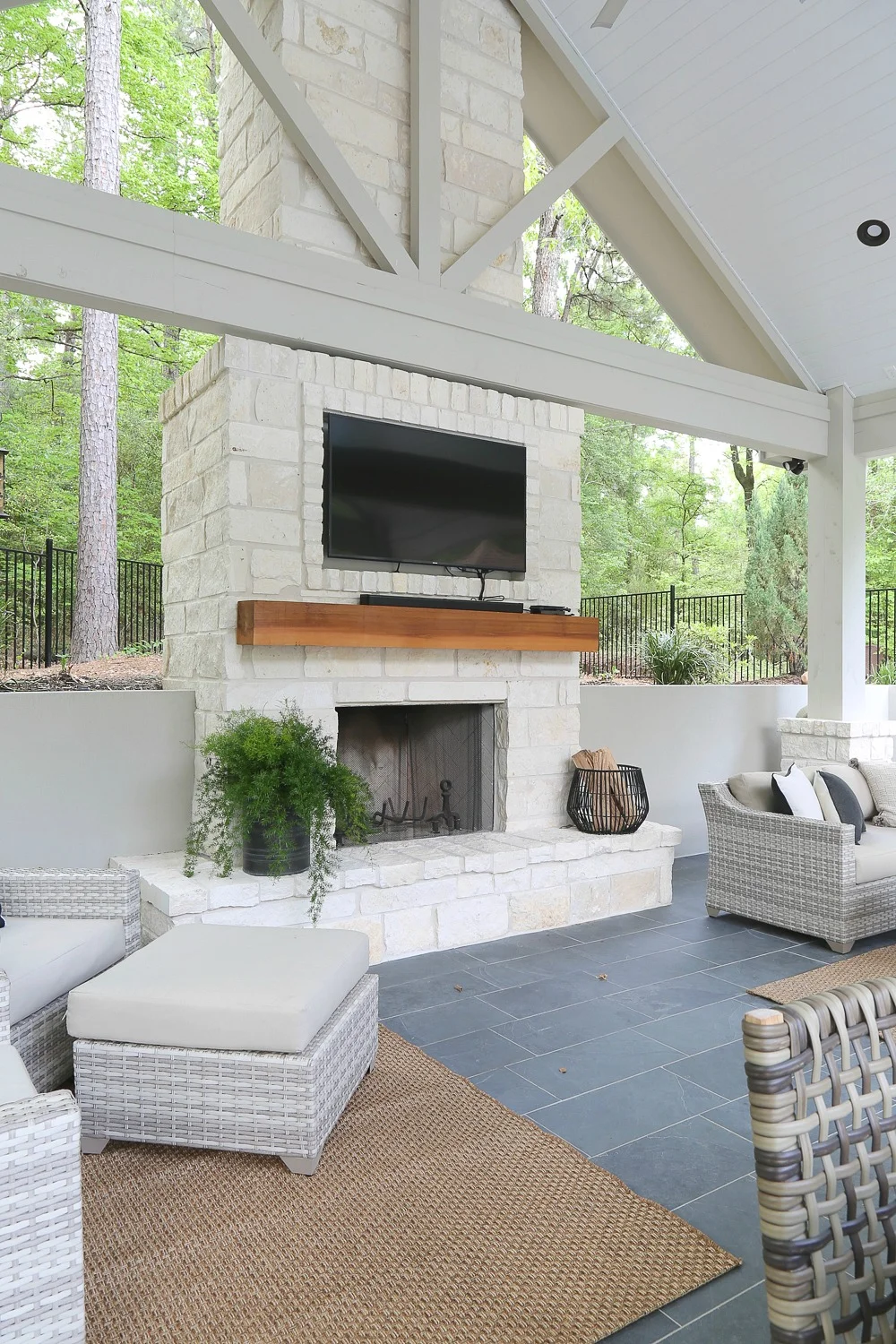 The wood on the fireplace is a solid cedar beam.