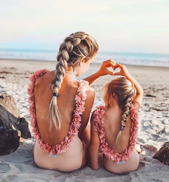 Lifestyle + Fashion Influencer Lauren Webb has such a cute Beach Pretty family..love the darling matching swimsuits.
