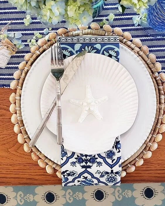 Coastal Blues…blue is a color you can use on your tablescapes all year round. I personally love to use blue accessories and linen with white dinnerware-this look is always crisp, classic and stunning. via