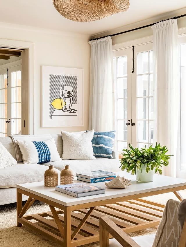 Classic Coastal Family Room with Natural Wood Furniture and Blue Accents