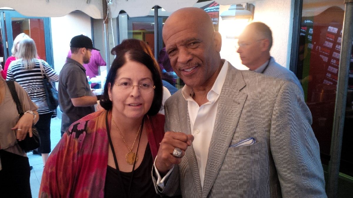 CPRA Vice President chatting up legendary Dallas Cowboys Wide Receiver Drew Pearson at ESPN gathering
