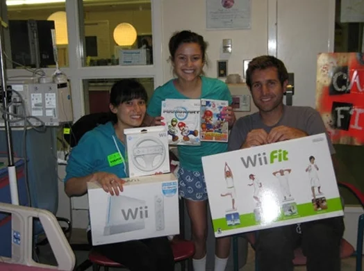 Caleigh receives Wii package.
