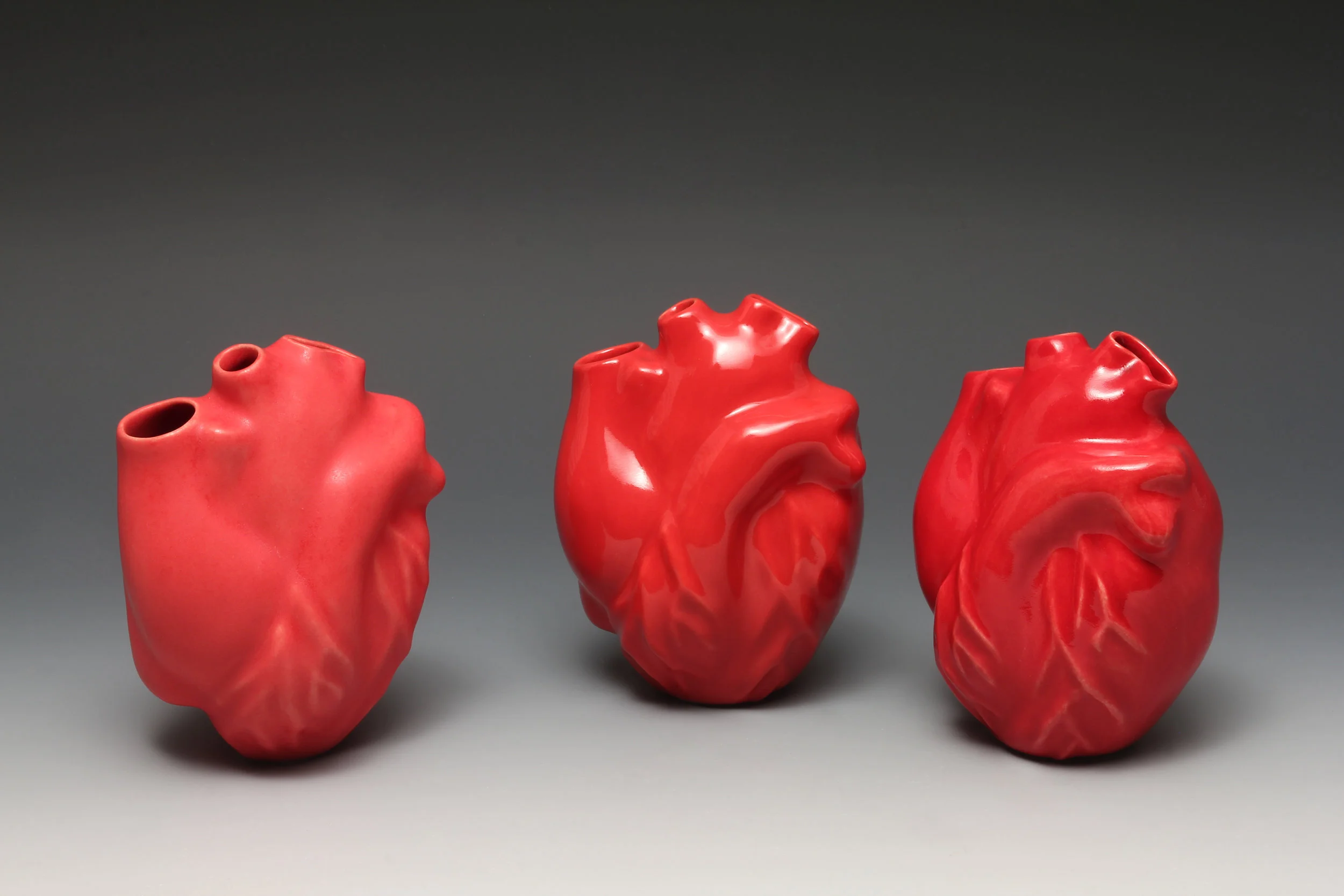 Heart vases, 4" H x 3" W