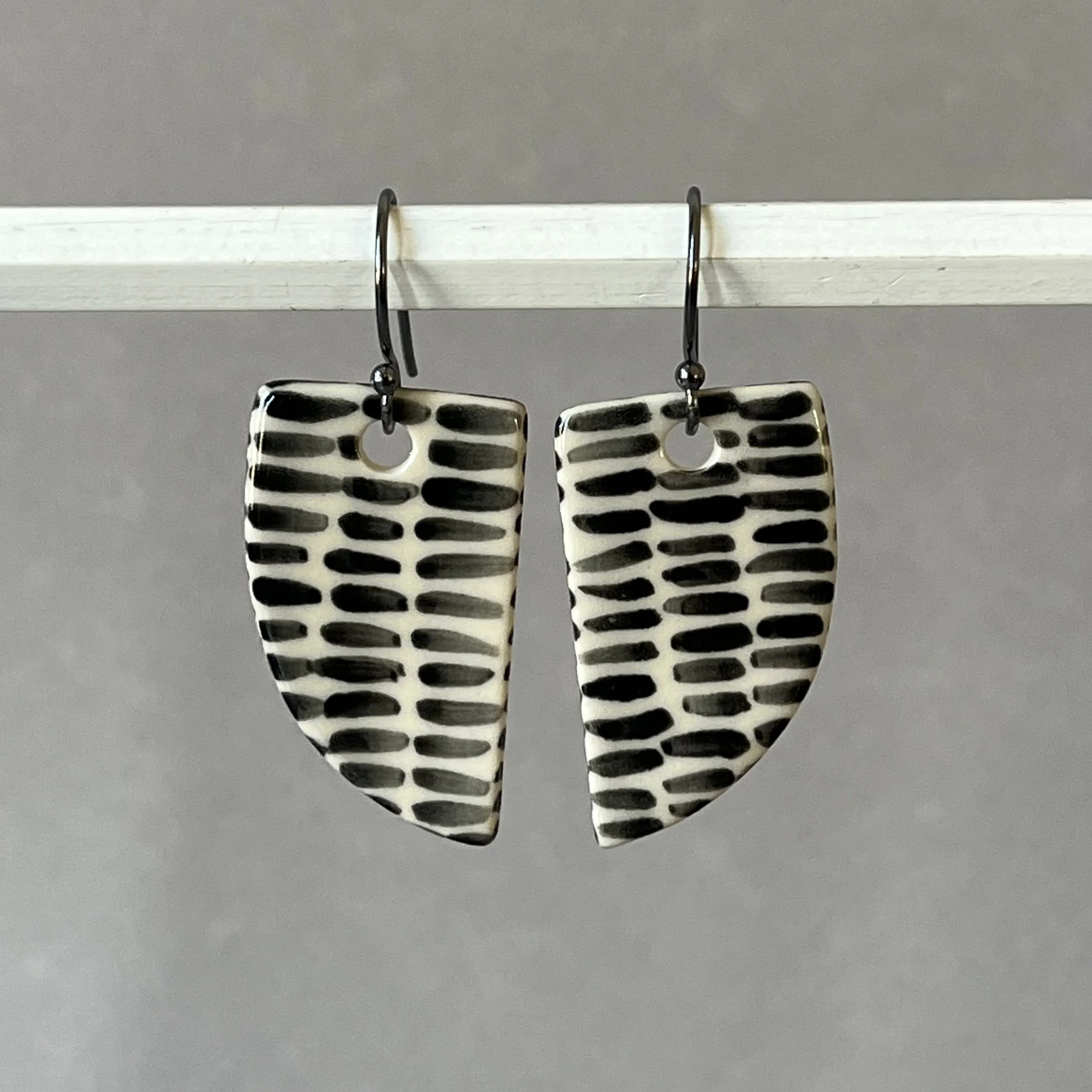 earrings_blackdasheshorizontaltusk_rachelcox.jpg
