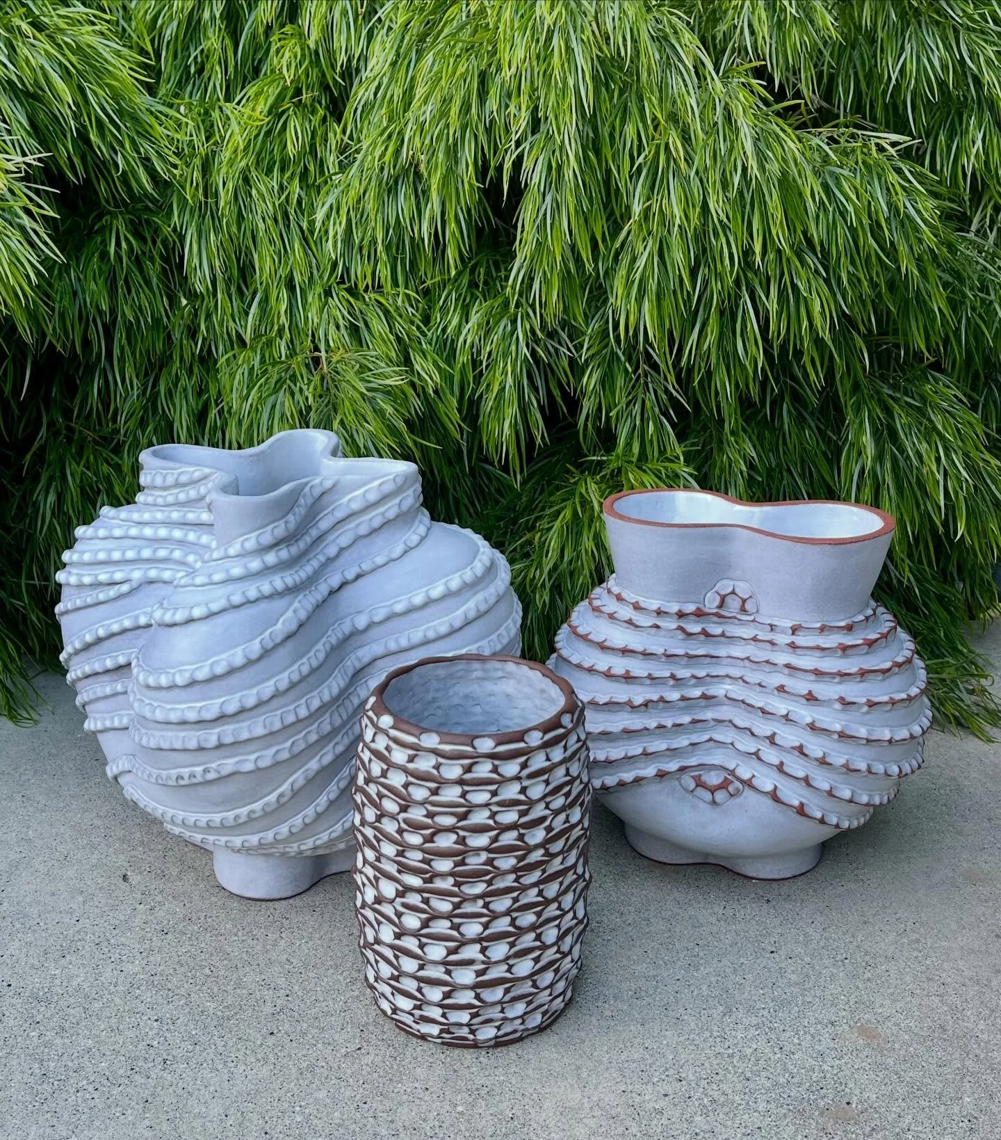 I recently rehydrated rich red and chocolatey brown clays that had been languishing in my studio storage, and revived techniques learned in a long-ago workshop that had been knocking around in my mind. I&rsquo;m exploring different ways to coil and p