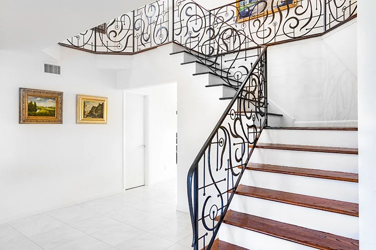 Custom Ornamental Steel Stair Rail.jpg