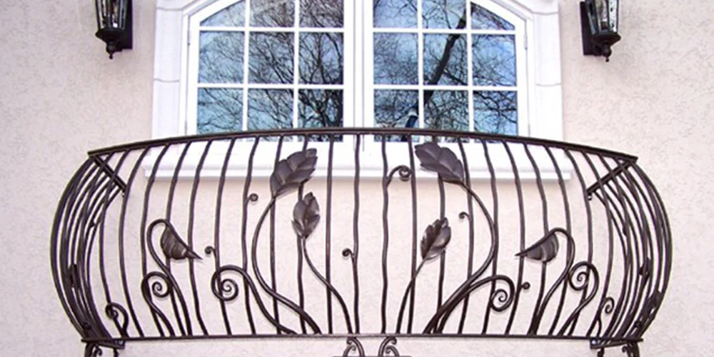 custom metal balcony forged leaves and scrolls.jpg