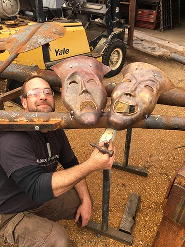 Repousse Metal Masks for Sculptural Archway.jpg