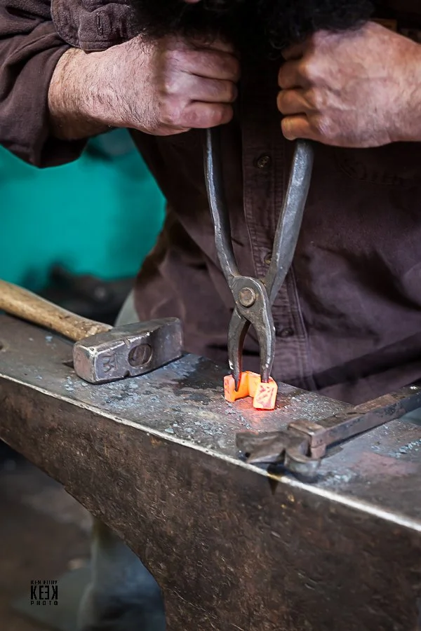 blacksmith forging metal for custom metalwork.JPG
