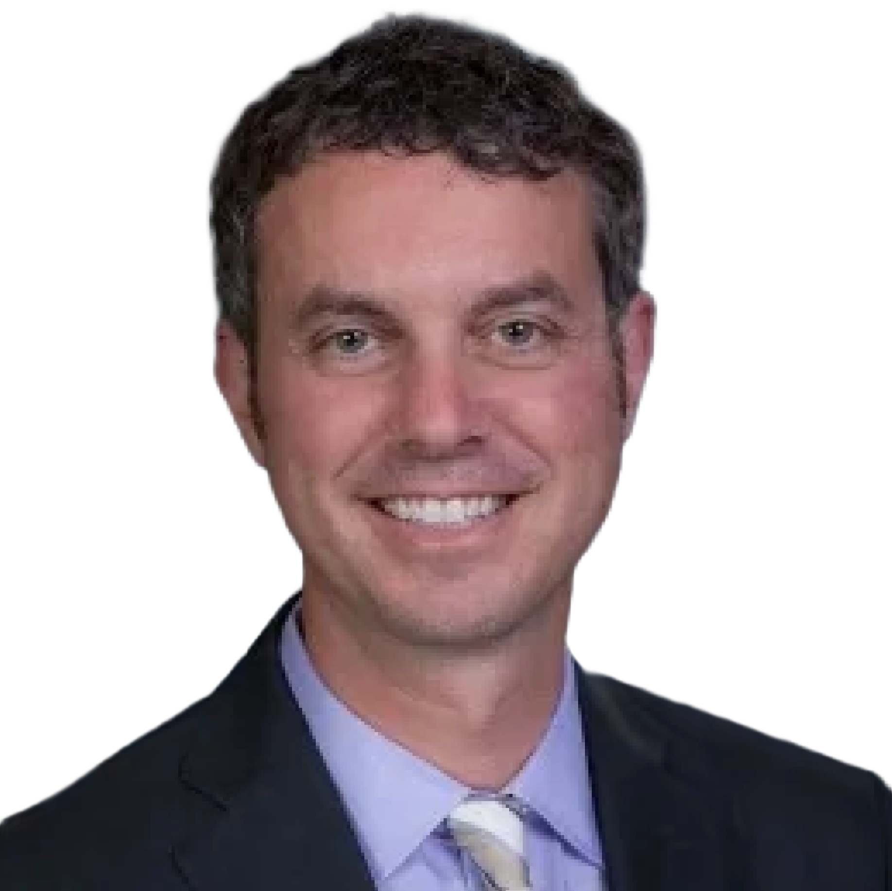 Smiling man with short dark hair, wearing a dark suit, light blue shirt, and a striped tie.
