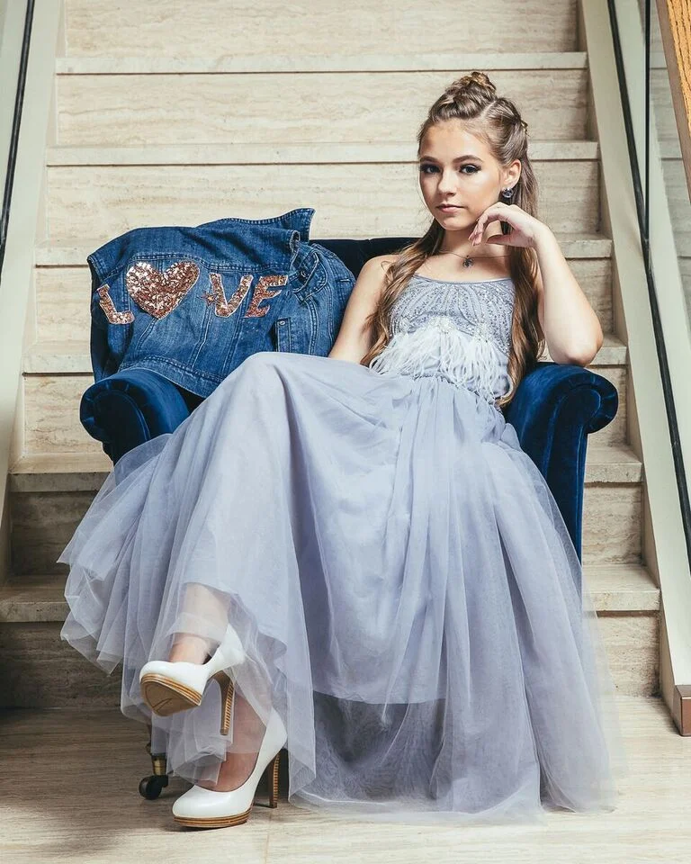 Photo: Eli Stack Model: Chloe Designer: Rainey's Closet Jacket: Redeux Kidz Jewelry: MCK Brands Hair/MUA: Josie Boyd