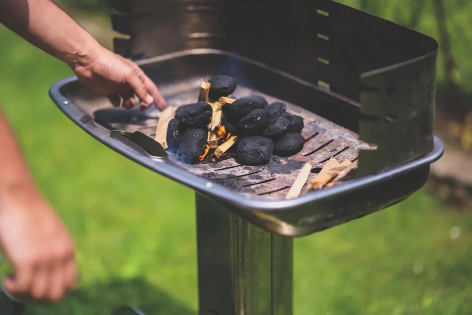Fire up the grill and impress your guests! Photo via Pexels.
