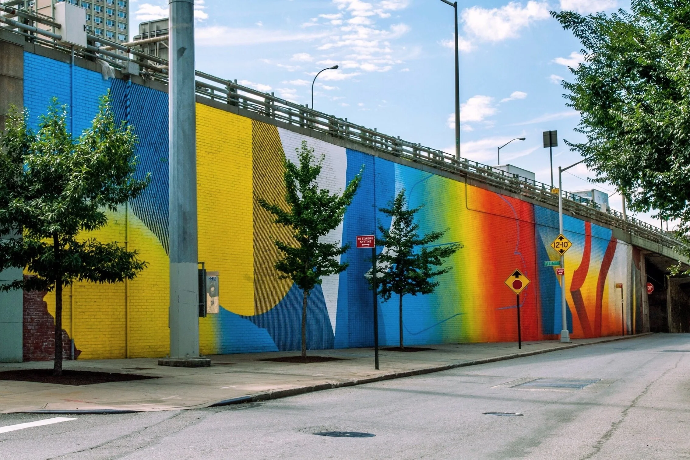 Colorful MOMO mural at DUMBO Walls in Brooklyn.