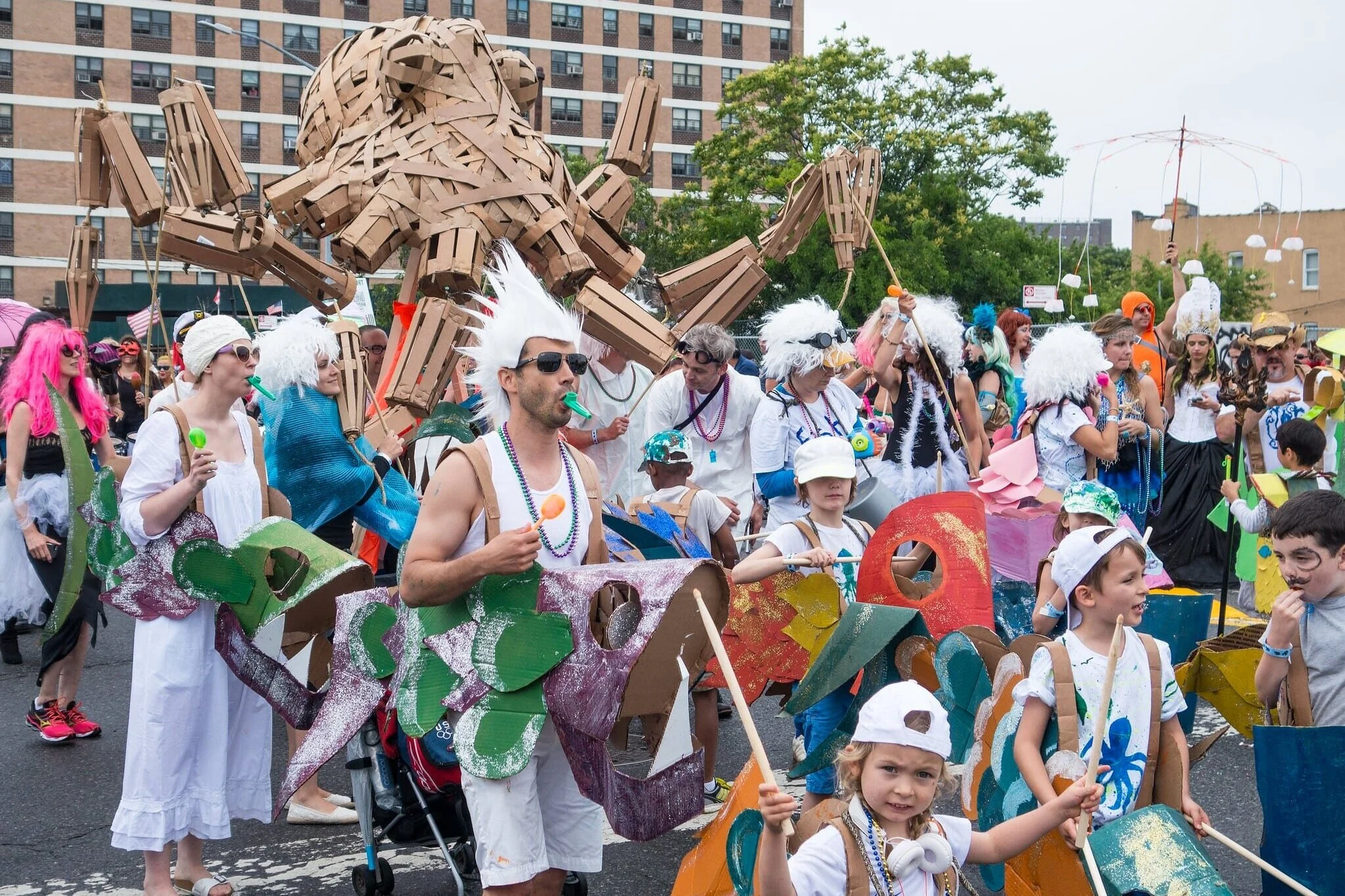 The lively mermaid parade marching at Coney Island.