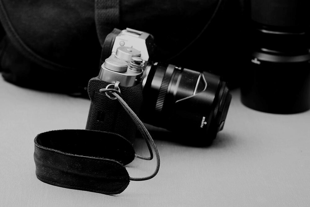 Dark brown leather camera wrist strap with string loop connection by Cam-in 