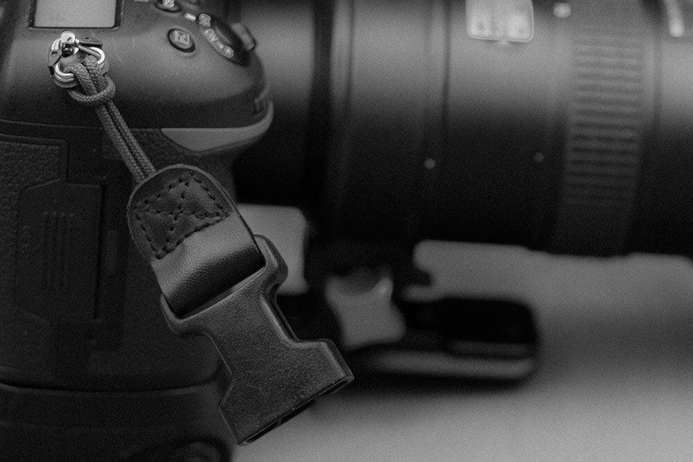 Quick release camera attachments HD cord loops on camera close-up