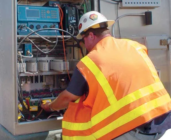 traffic-signal-technician-working-on-intersection-control-cabinet.jpg