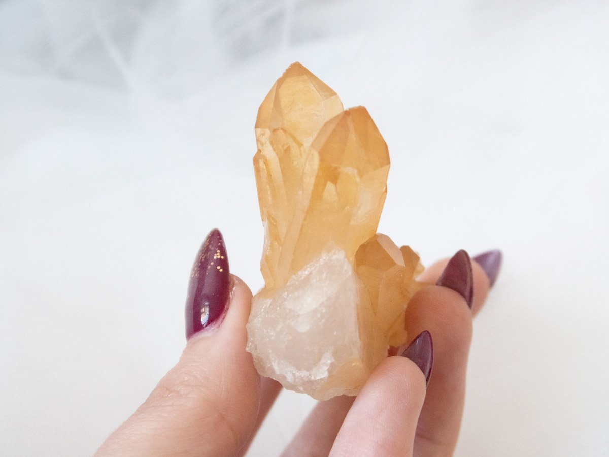 Tangerine quartz cluster C: Larger piece with 2 larger central points, and a medium orange colour