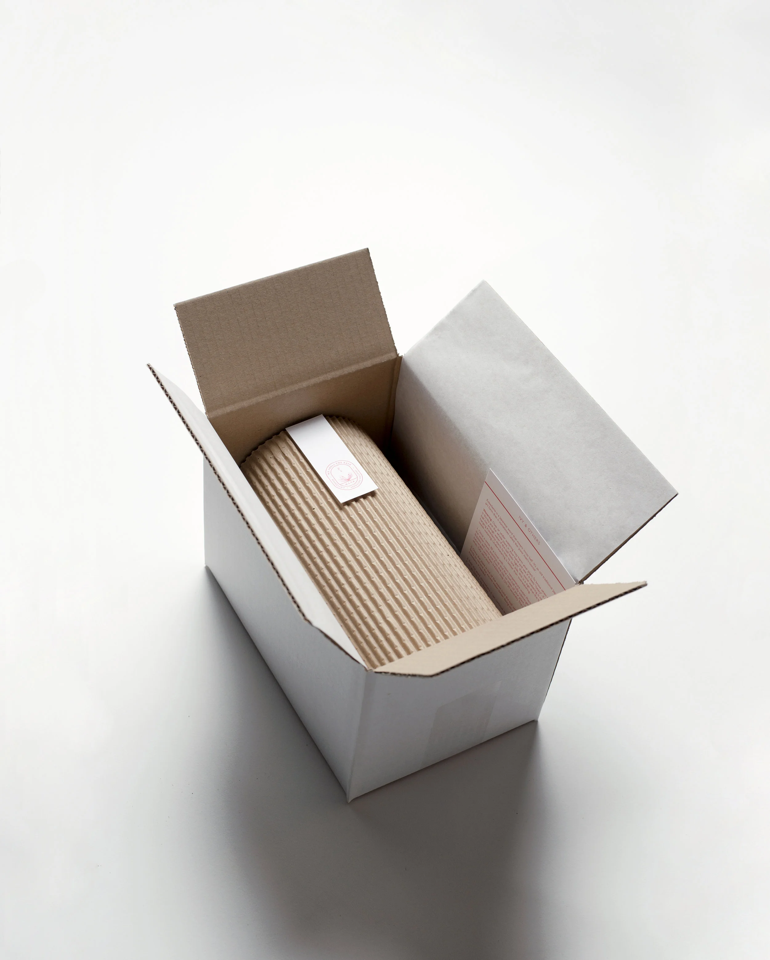 Online store packaging. All Kokedama were packaged and posted throughout Europe with a plant specific care card. 