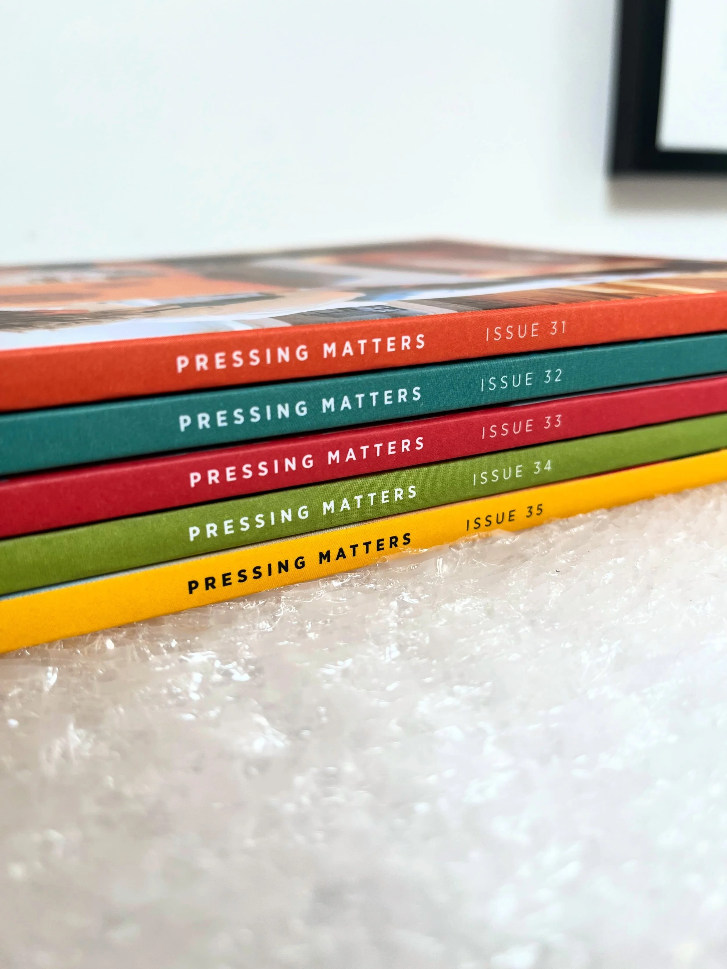 A nice colourful selection of spines from our available back issues and current issue - packing these up and sending them out today. Someone&rsquo;s in for a treat of 500 pages of inky inspiration, printmaking people and their stories. 

Our latest e