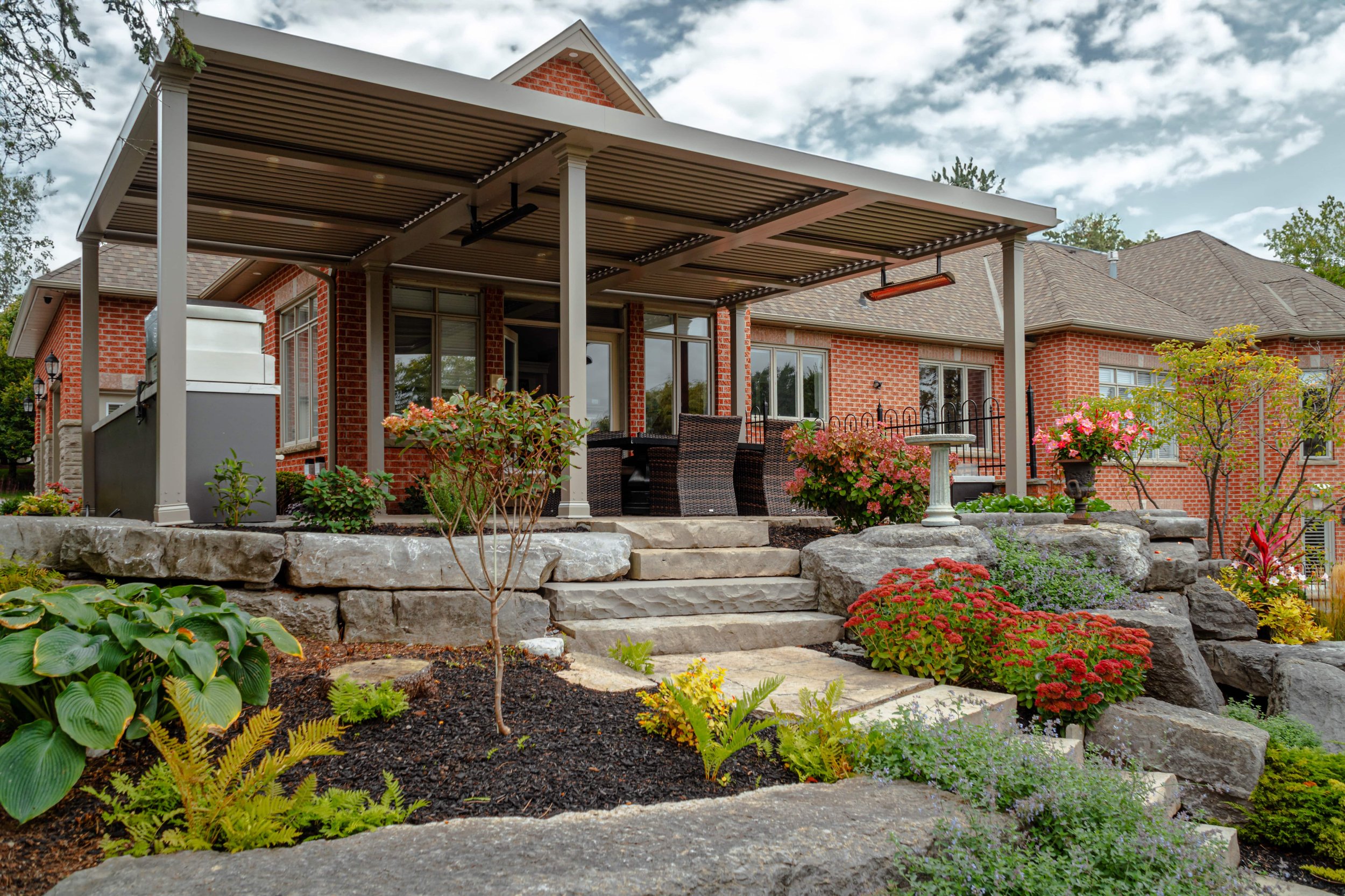 residential-attached-pergola-fire-feature-heaters-fans-outdoor-kitchen-backyard.jpg