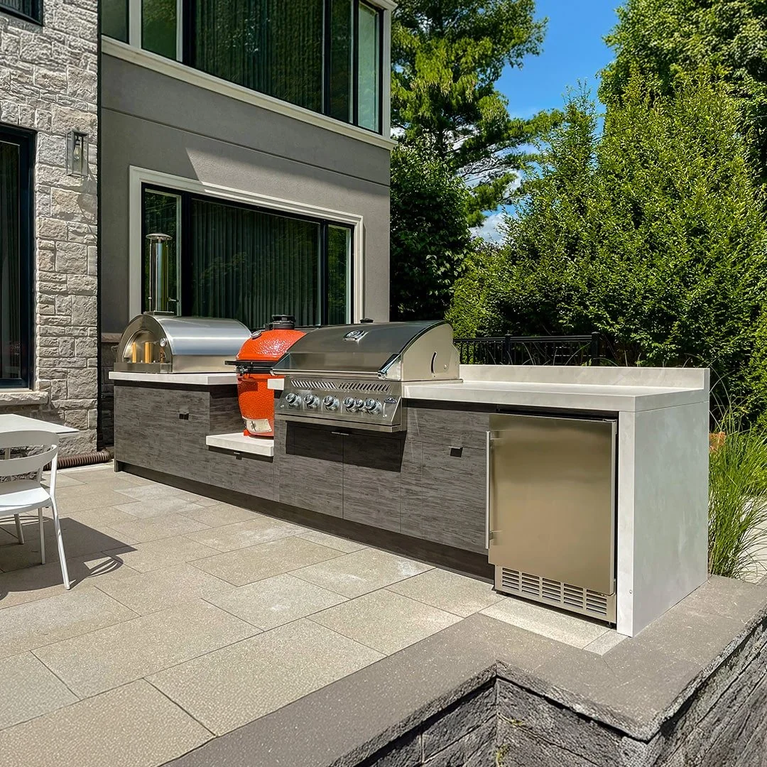 custom-outdoor-kitchen-smoker-bbq-grill-pizza-oven-built-in-garden-living.jpg