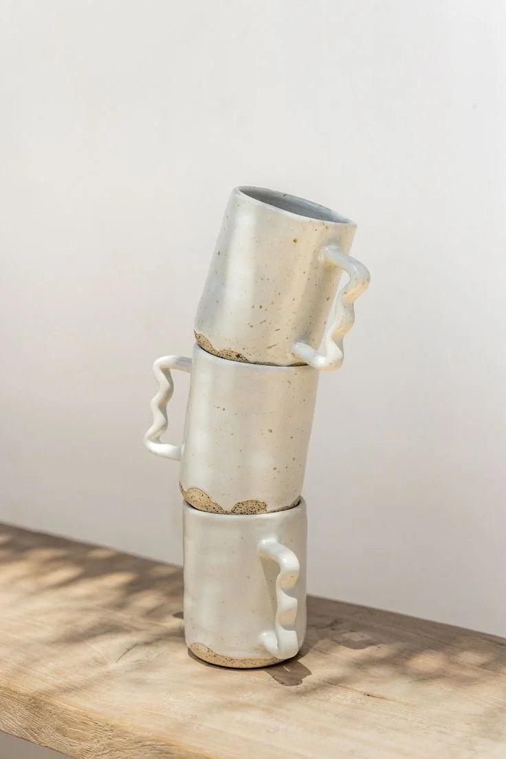 Ceramic Coffee cup with wavy arm