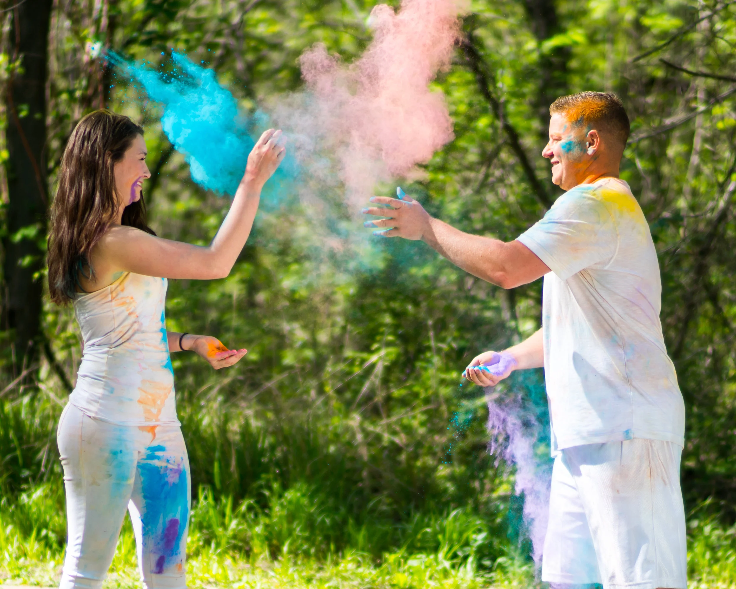 Dusti and Evan in a heated color powder fight, following the 2017 Dallas Color Run, photo by AJ Miragliotta