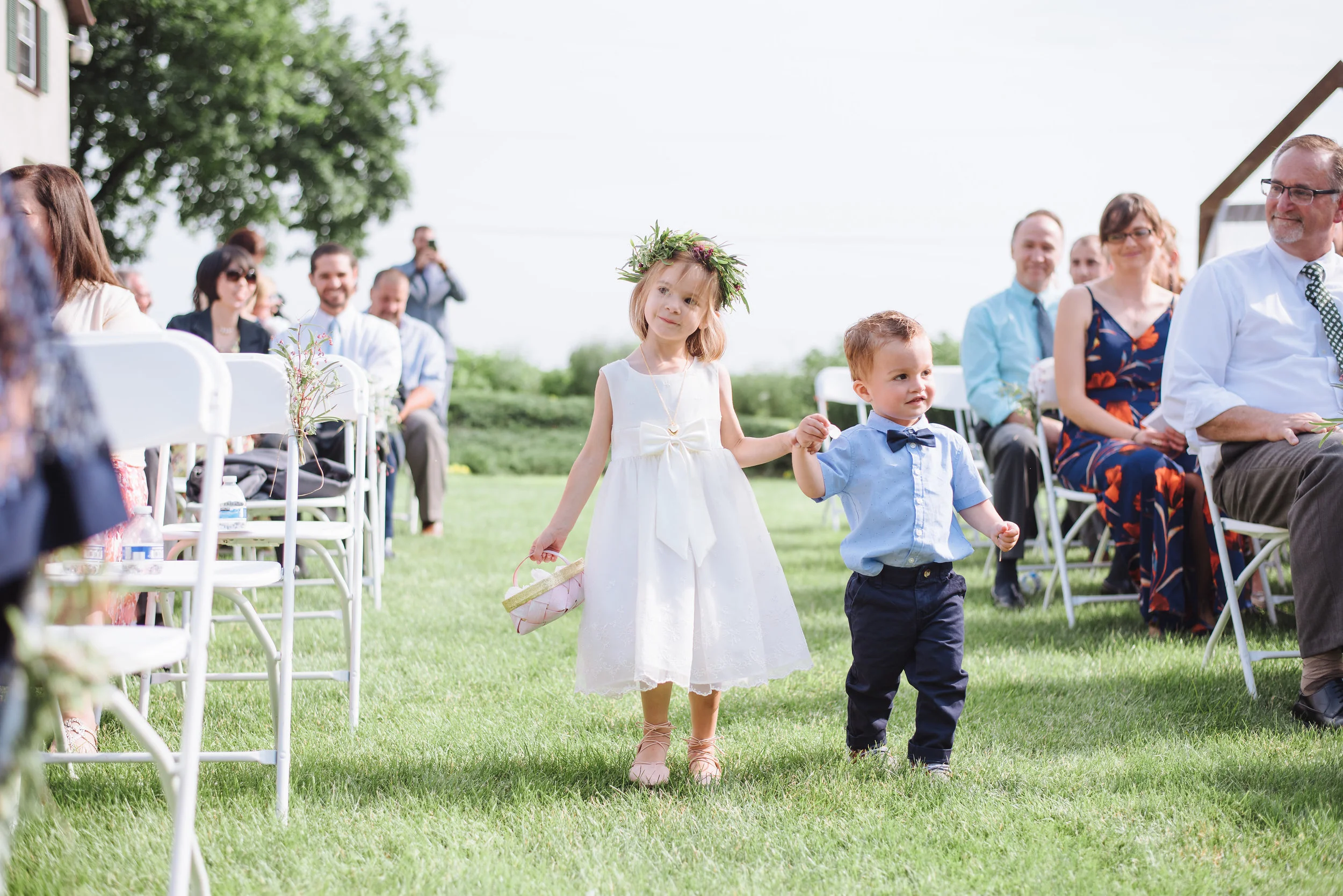 A flower crown is the perfect way to adorn your sweet flower girl with little blooms and greens