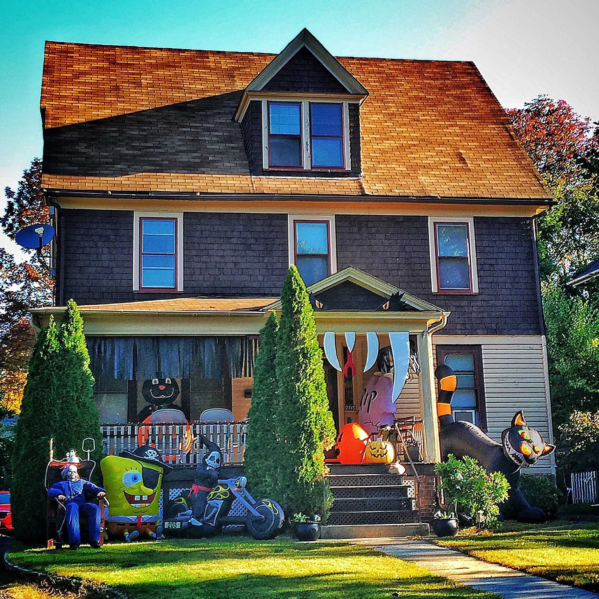 This is a crazy haunted house on Halloween with lines of kids from all over town!