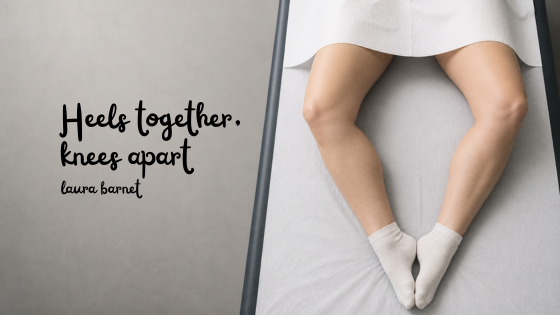 “Legs positioned for a cervical screening exam, knees apart and heels together on a medical bed.”