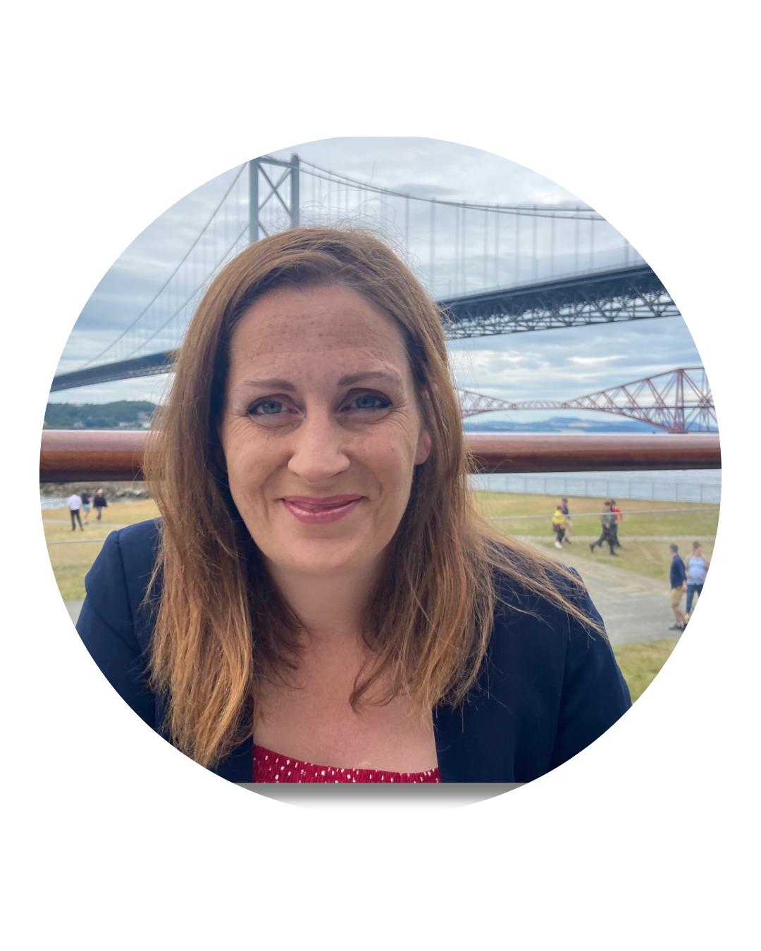 Headshot of Allison Meldrum, sitting smiling at the camera with the forth bridges behind her