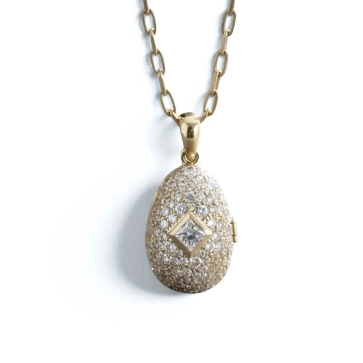 Egg All Pave LOCKET with square diamond solitaire center 18 K yellow gold