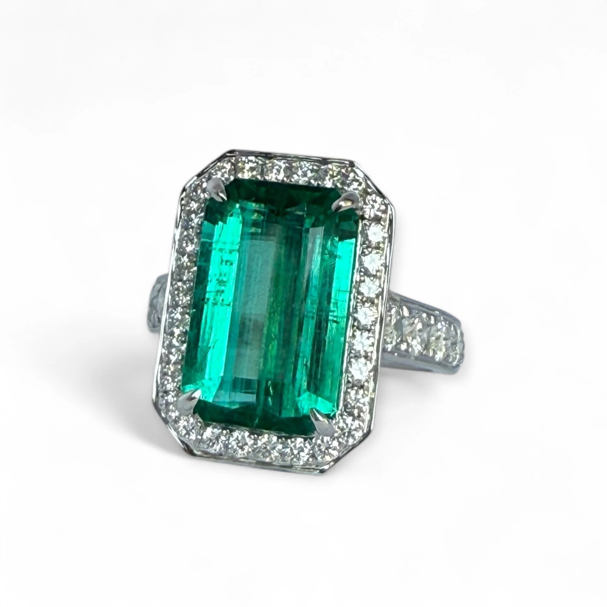 Significant Emerald Solitaire (Emerald Cut)  and brilliant cut diamond ring