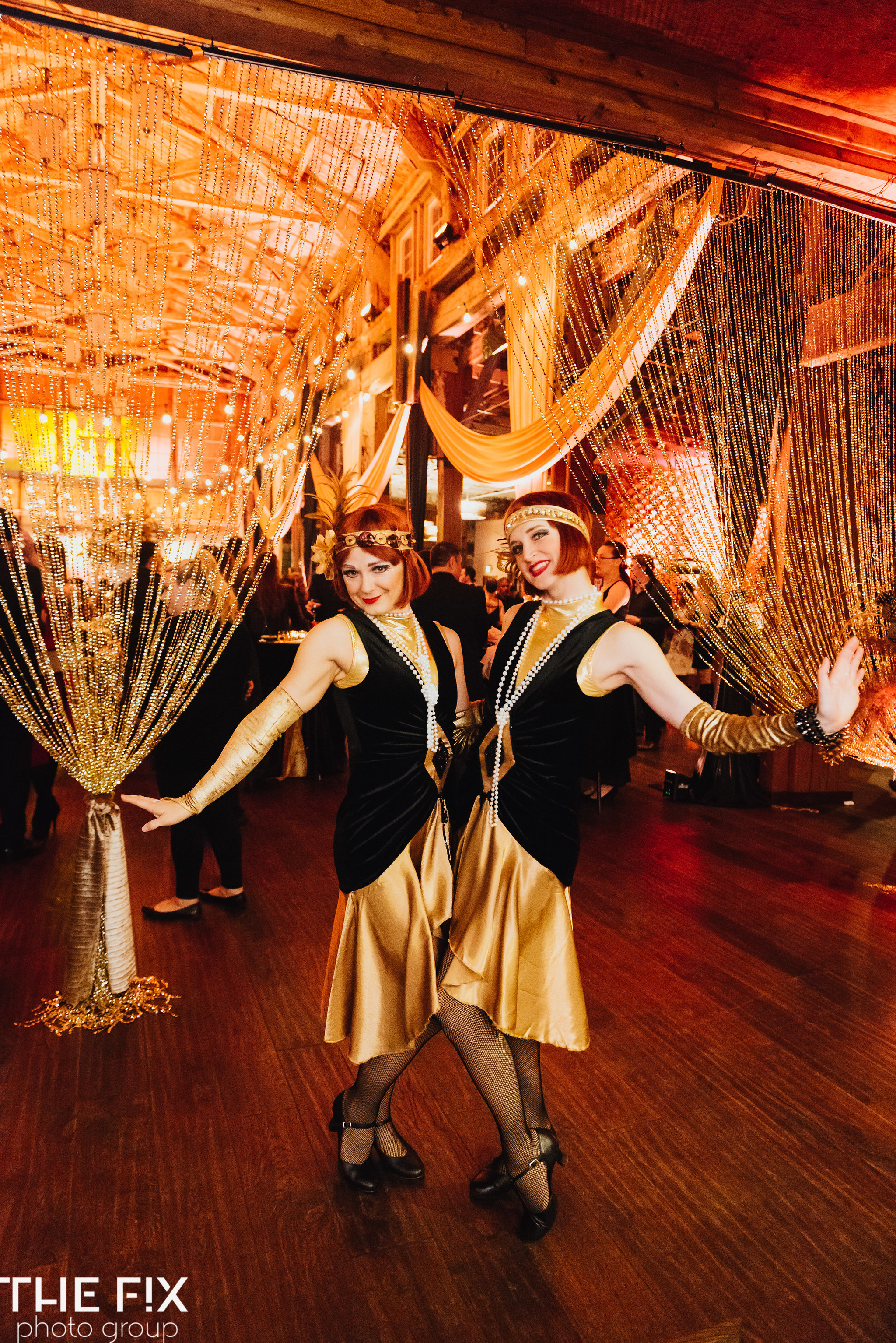 Corporate holiday party entertainment at Herban Feast , photographed by the Fix Photo Group