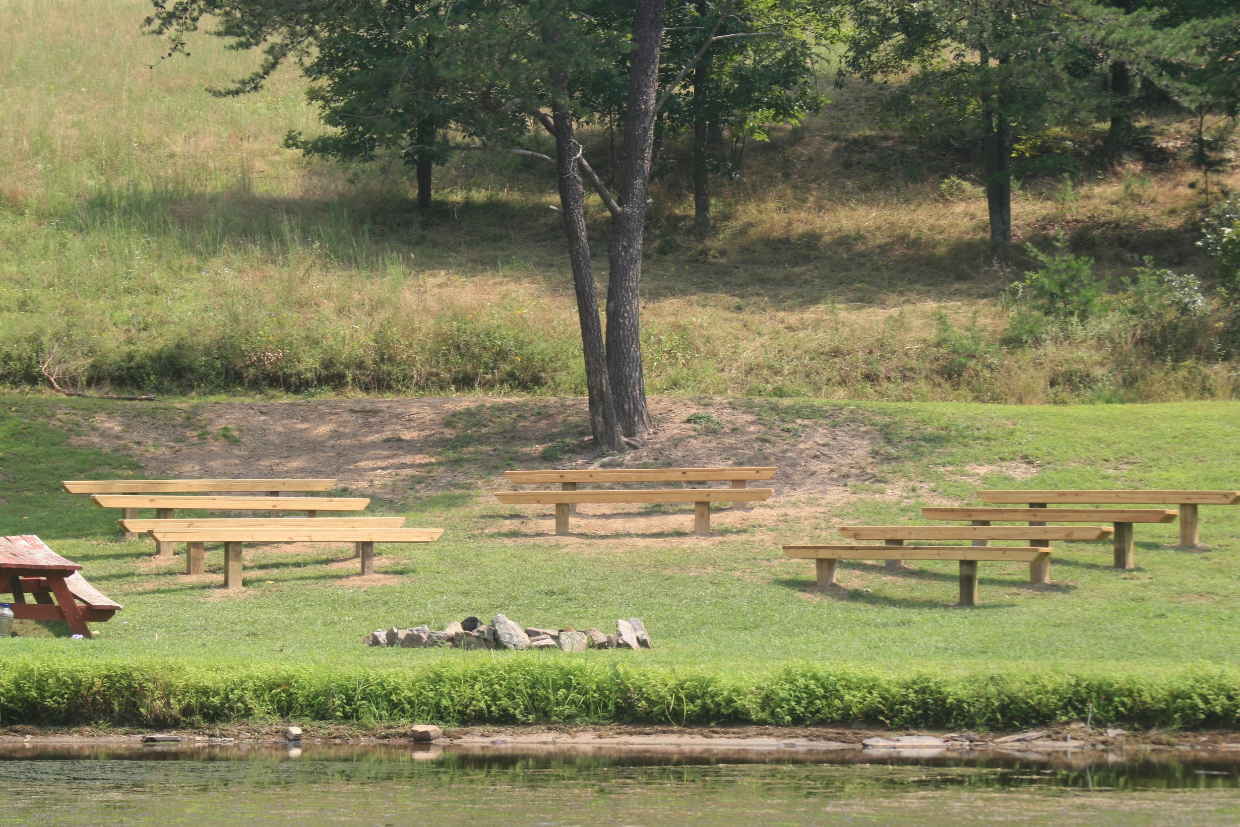 One of our beautiful ceremony sites - right beside our lake.