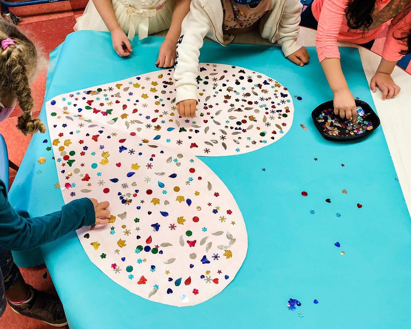 Working together to make our heart sparkle 💙✨

Image Description: Four students are gathered around a giant white heart on an aqua background. They are arranging lots of jewels, gems and sequins on the heart.

#preschool #preschoolActivities #EarlyC