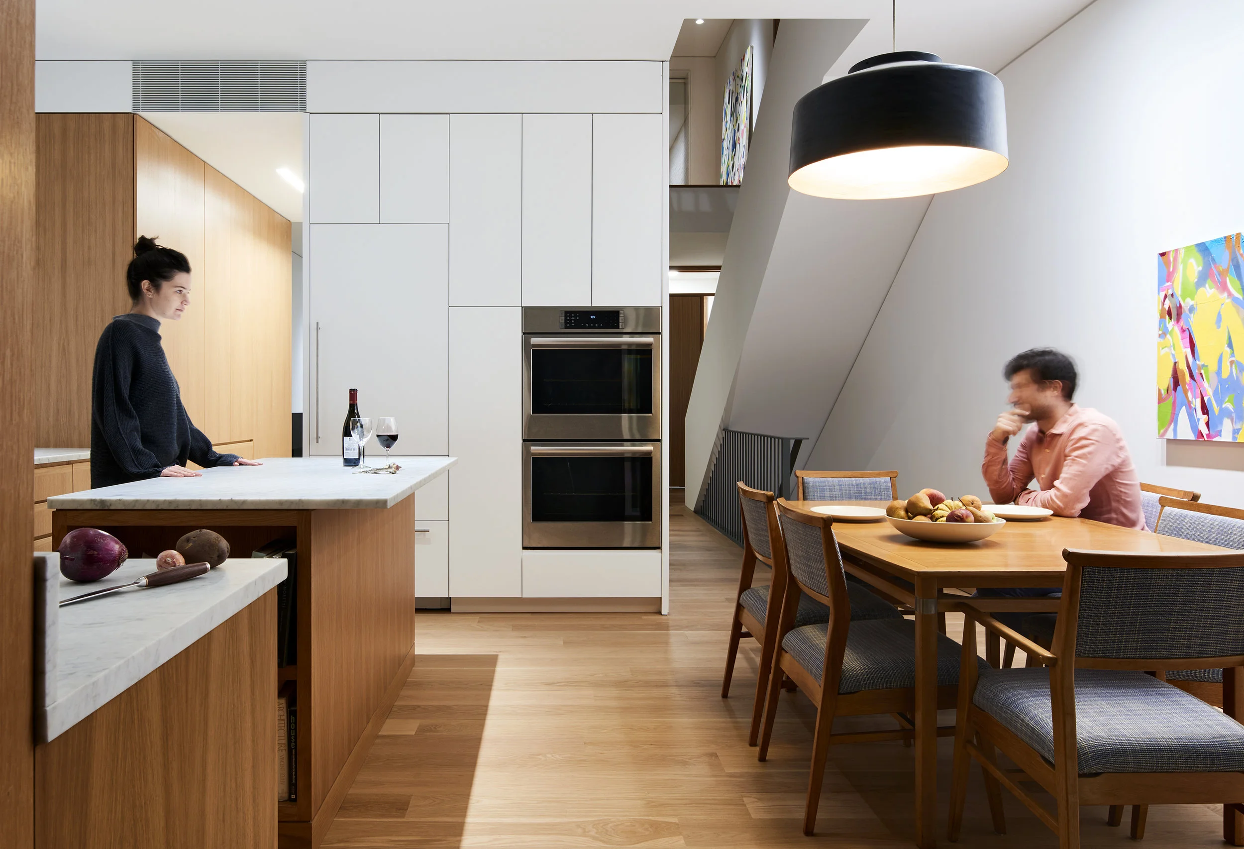 modern townhouse kitchen at night.