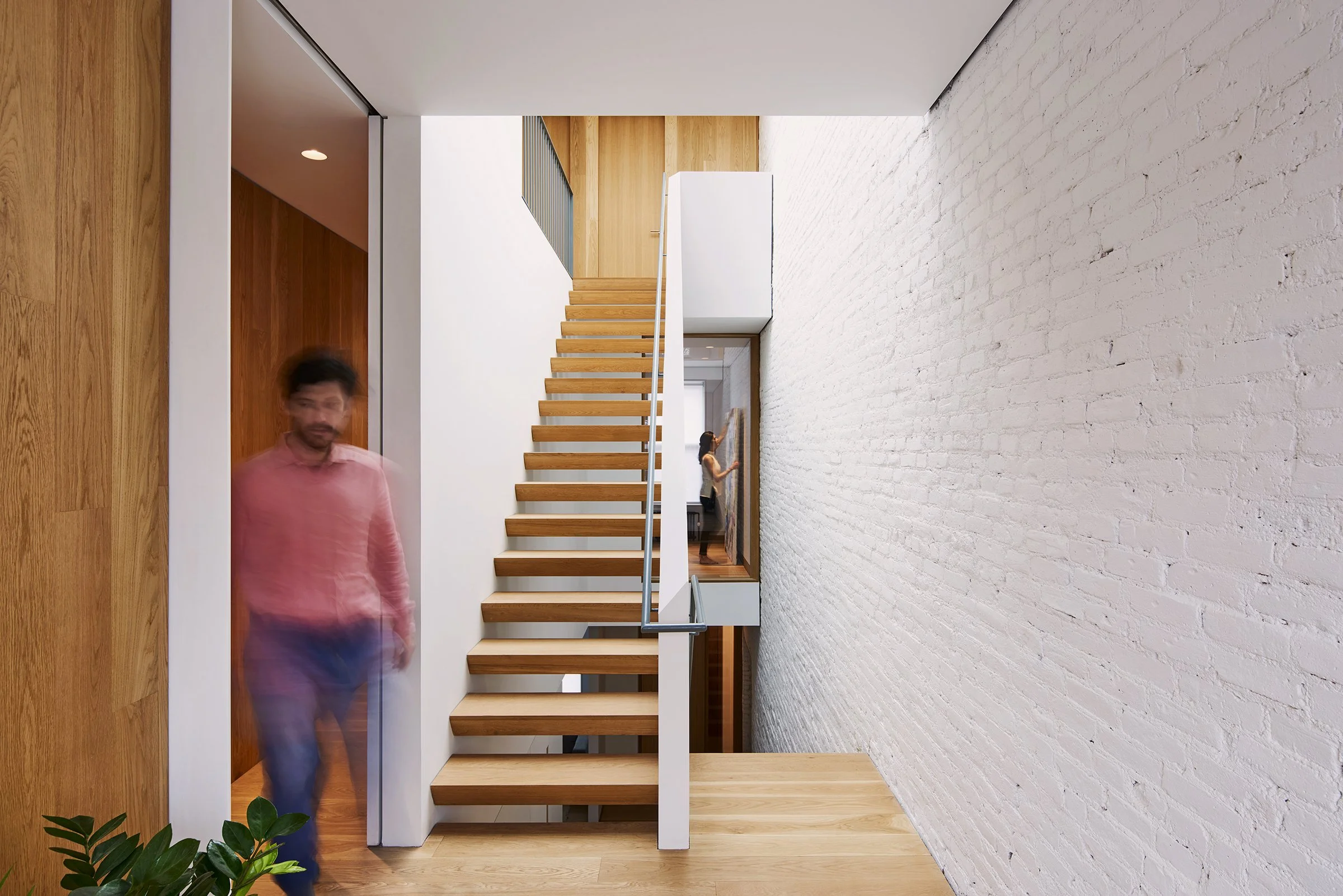 modern townhouse stair with skylight.