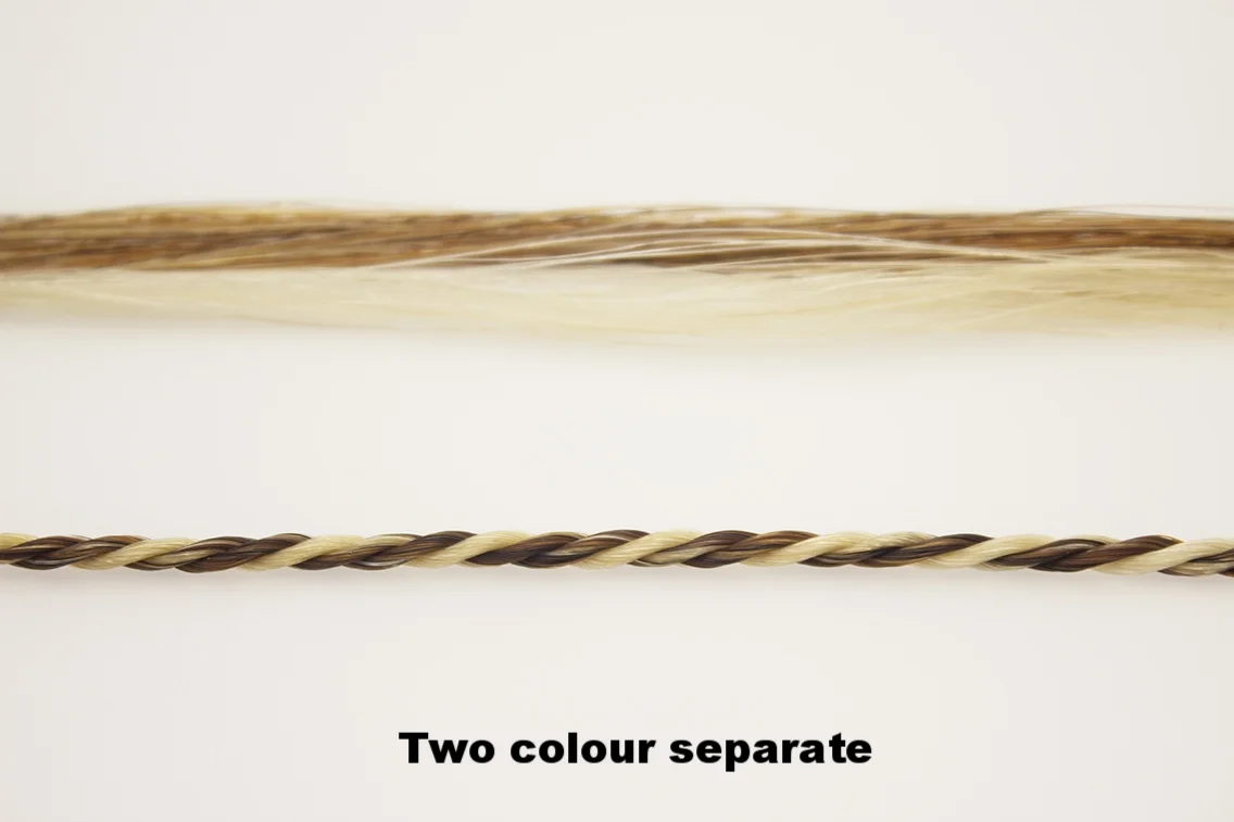 Two strands purely of each colour while the third strand is half and half.
