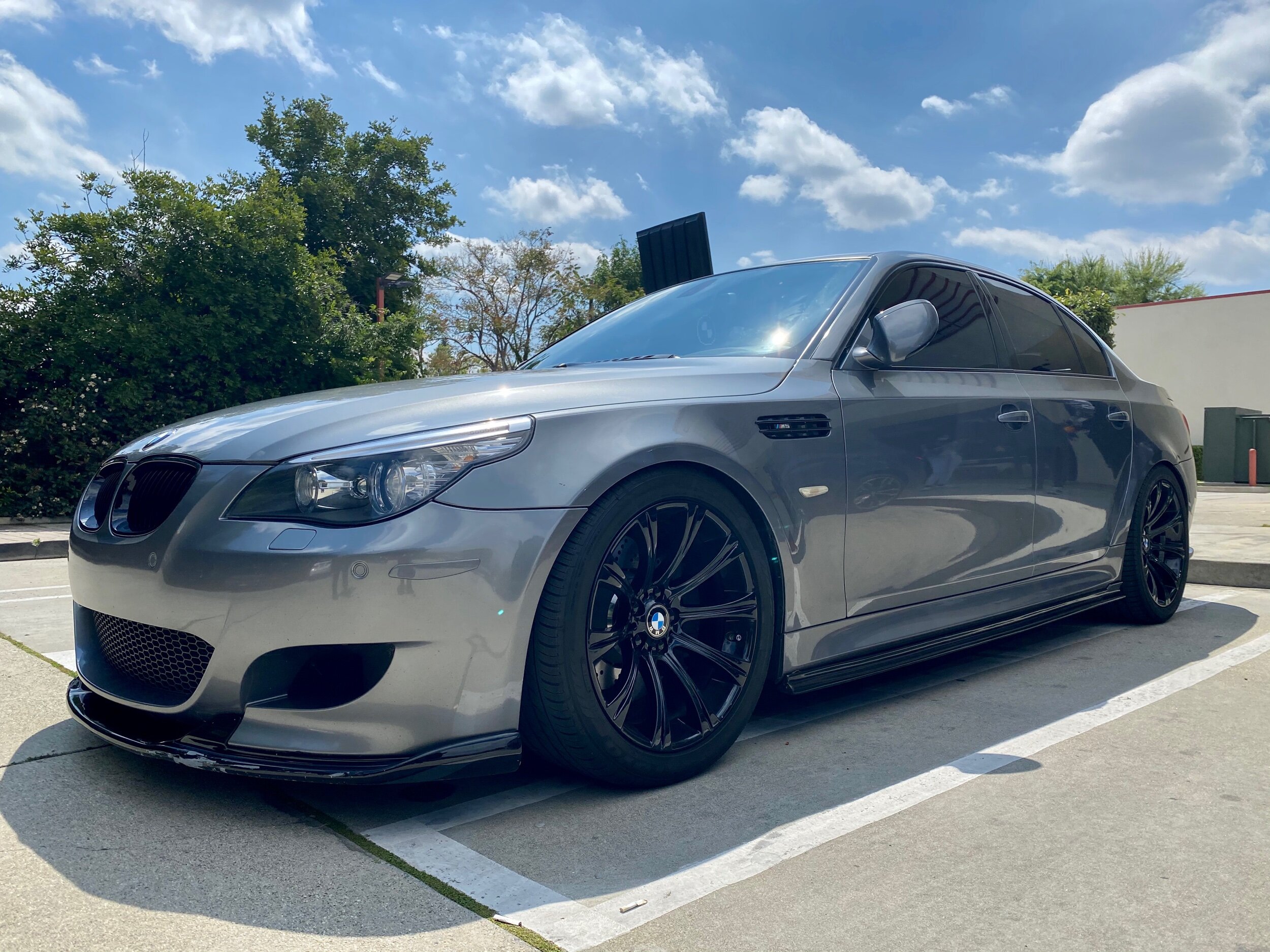 BTG713~N - BMW E60 M5 on Avant Garde Wheels SR10 finished with Gloss Black  centers with Carbon Fiber lip and Candy Red hardware.