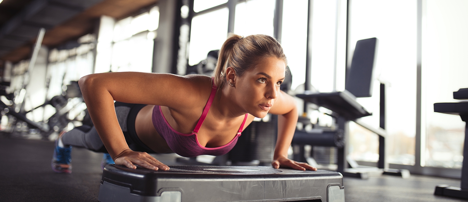 iStock-female doing push-ups on the step board 618196974.jpg