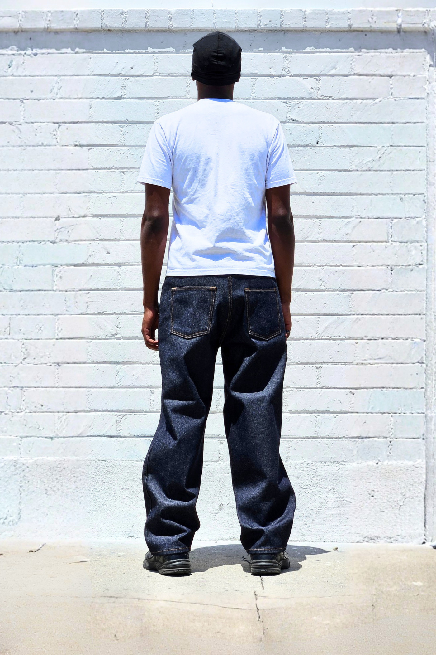 super-dark-baggy-raw-denim-jeans-back.png