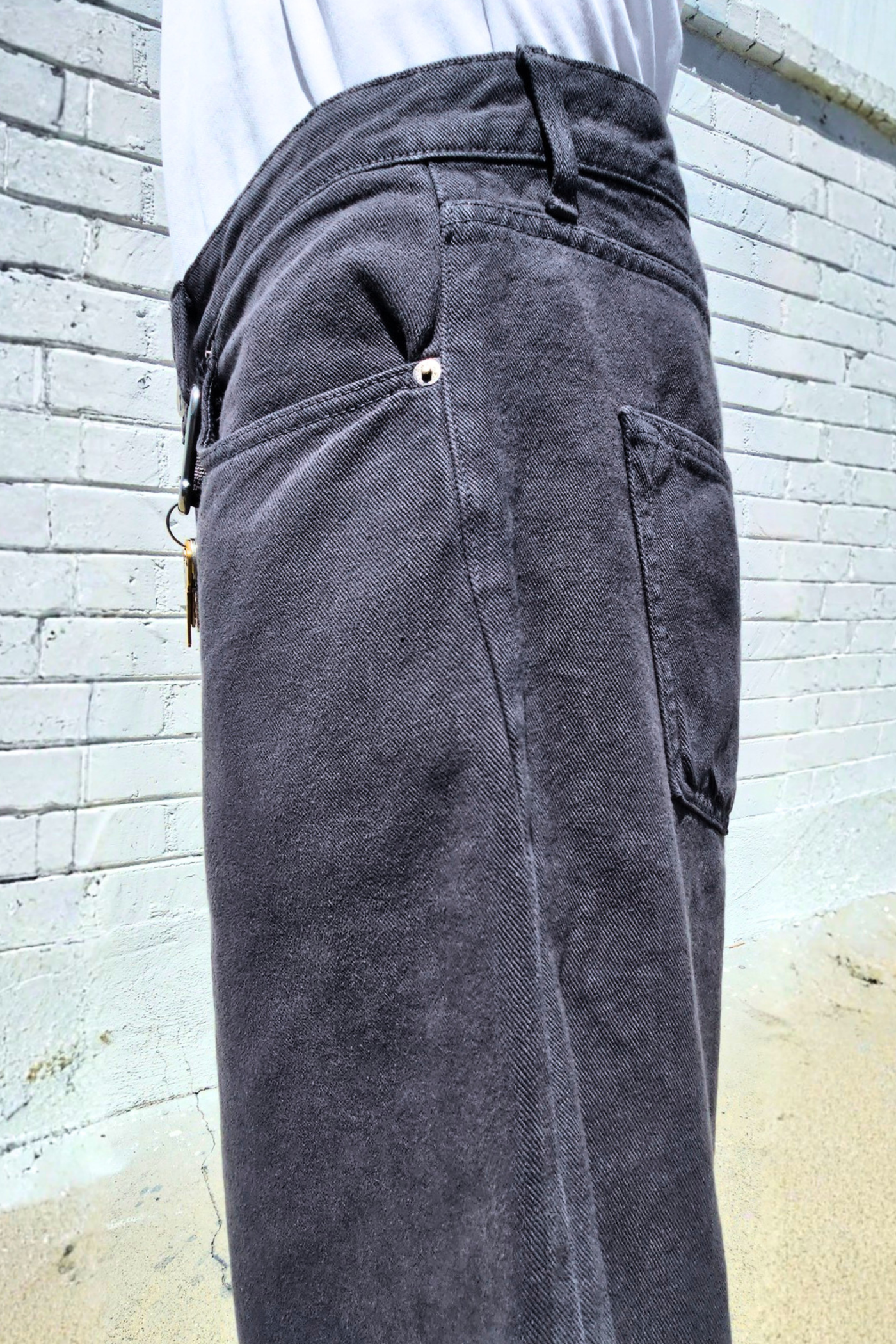 Oversized charcoal denim shorts for men featuring a relaxed streetwear fit and classic five-pocket construction.