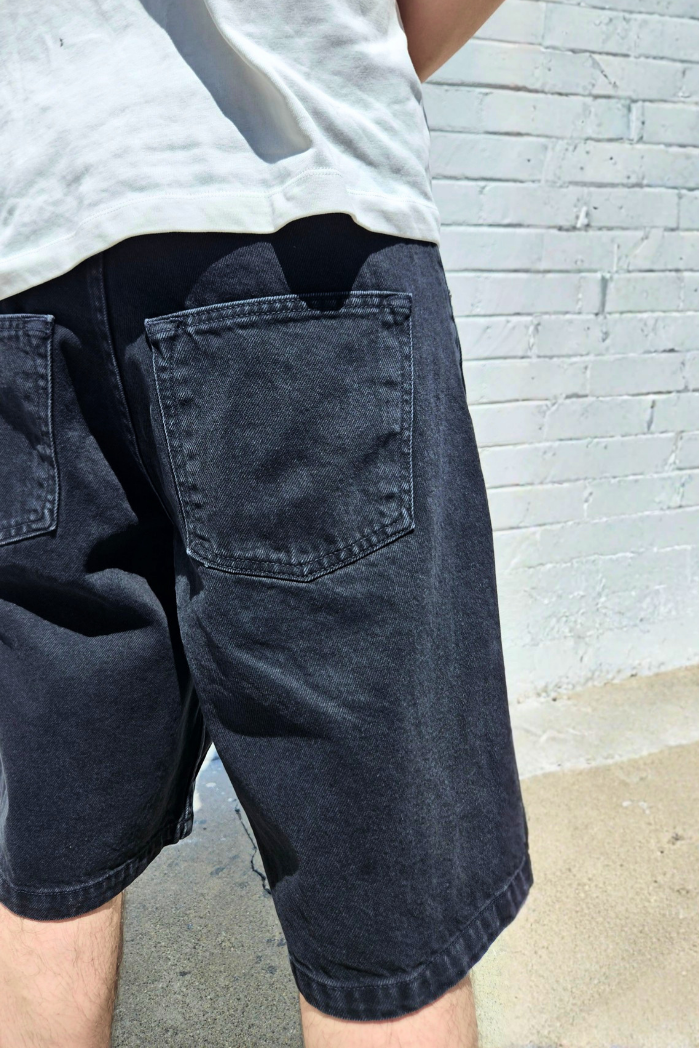 Black baggy jorts in vintage washed denim
