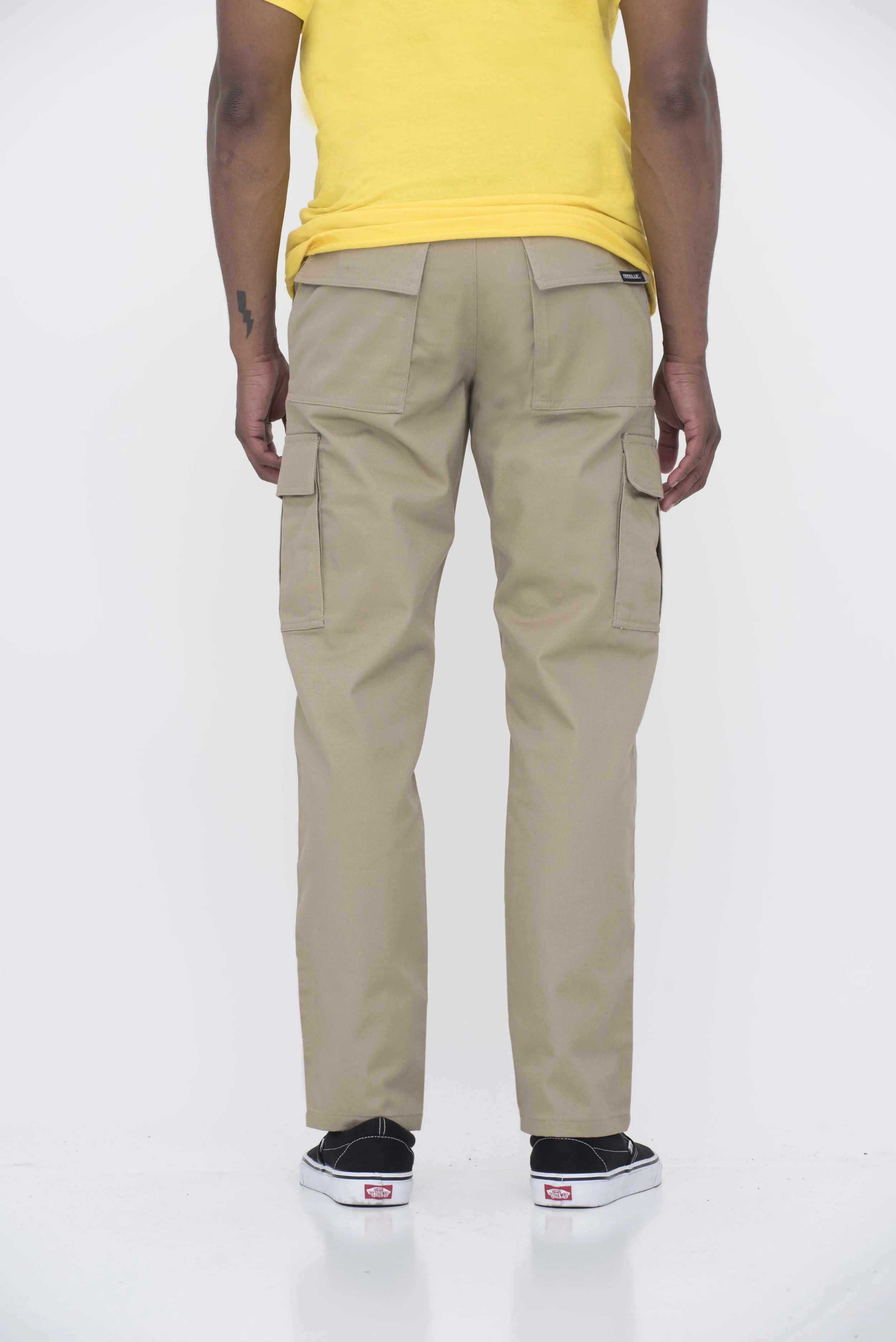 Back view of model in khaki cargo pants.
