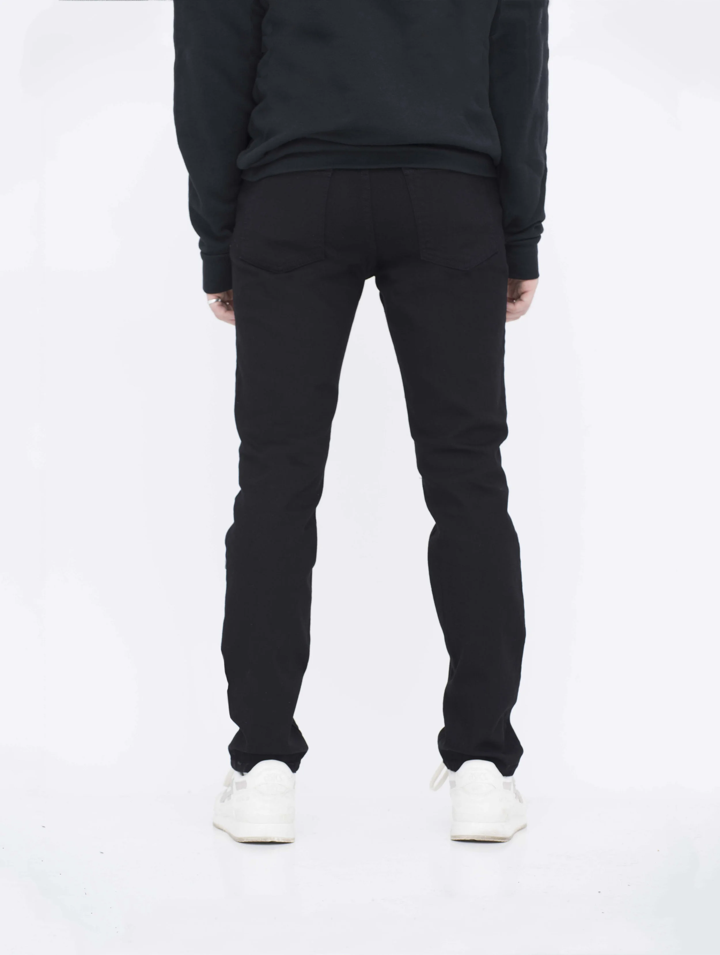 Men's classic black skinny denim jeans with a fitted leg