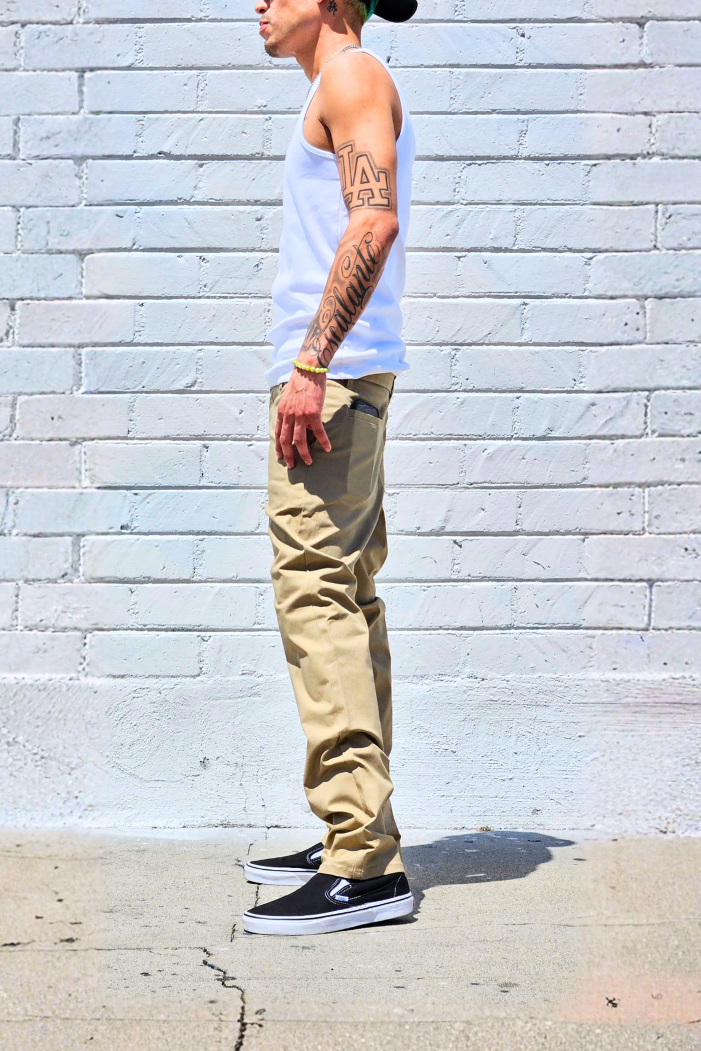 Khaki casual chino pants with a clean and classic silhouette.